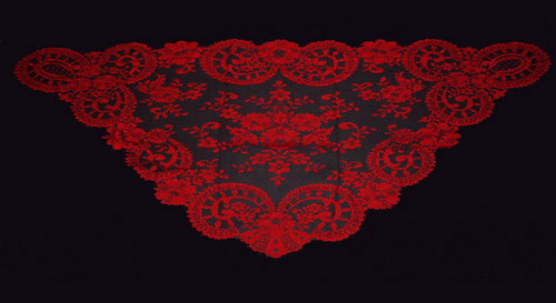 Triangular shawl red colour. Measurements: 60cm X 115cm