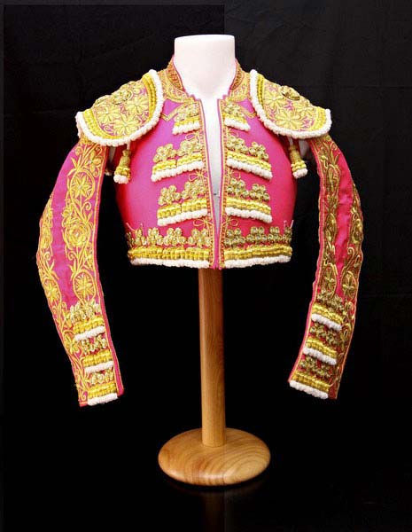 Authentic bullfighter outfit.  Fucsia and Golden.