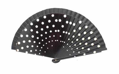 Black fan in wood painted with white polka dots on both sides