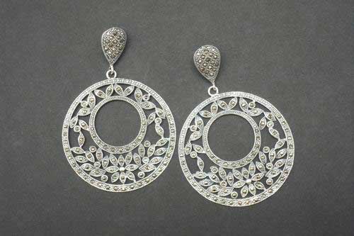 Silver and marcasistas earrings. Circle with leaves.