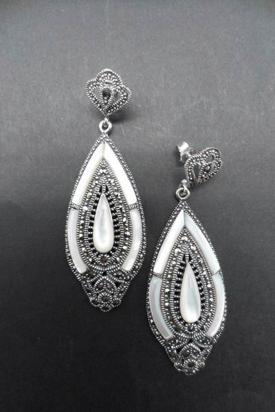 Silver and Marcasite Stone Earrings with Mother of Pearl protracted drop and details on the sides. 6cm