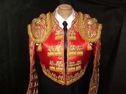 Authentic bullfighter costume. Red and Gold.
