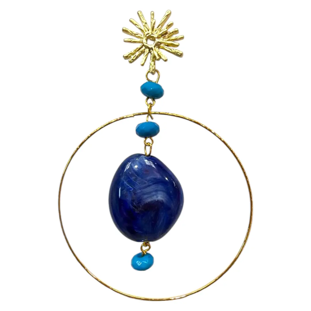 Flamenco earrings with a golden hoop and striking blue stone