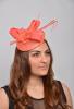 Headdress Lara. Sinamay and Feathers in Color Peach