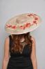 Sinamay Floppy Hat in Champagne decorated with Red Flowers. Romina